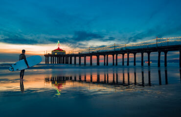 Contemplative surfer dude at Manhattan Beach Pier